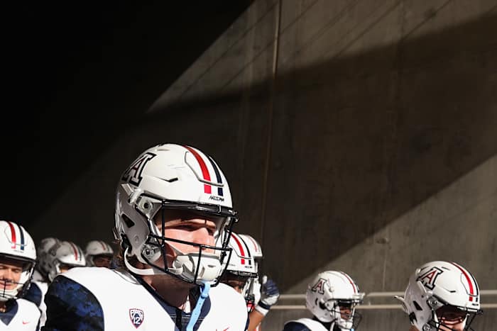 Tight end Alex Lines #88 of the Arizona Wildcats walks to the field before the Territorial Cup game against the Arizona State Sun Devils at Sun Devil Stadium on November 27, 2021 in Tempe, Arizona.